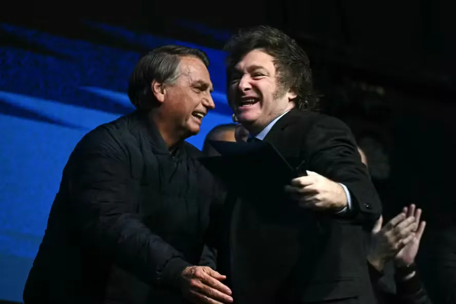 107615645 topshot former brazilian president jair bolsonaro l greets argentinas president jav
